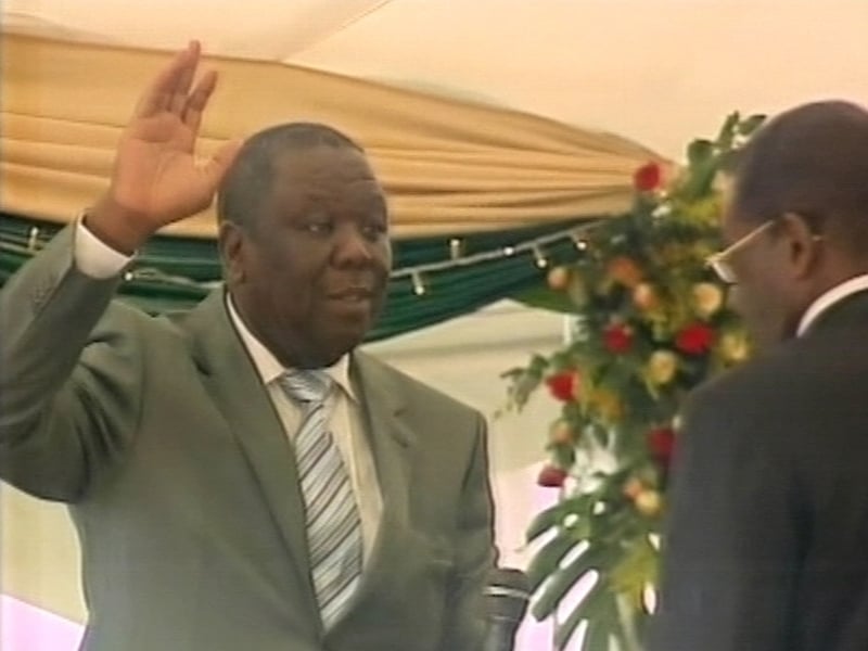 Tsvangirai &amp; Mugabe - New Zimbabwe PM sworn in