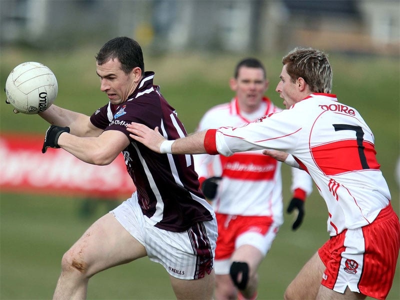 Dessie Dolan evades Derry's Gerard O'Kane