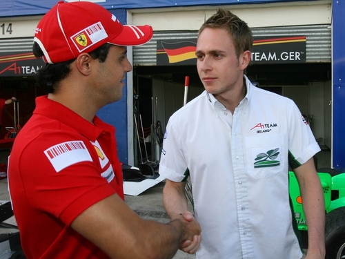 Adam Carroll (r) pictured with Ferrari driver Felipe Massa (l)