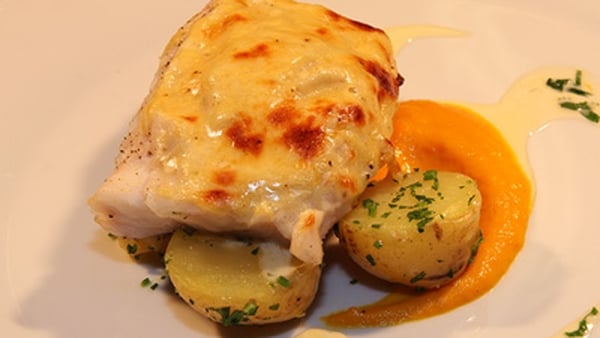 Baked Gratin of Hake with mature cheddar, mustard