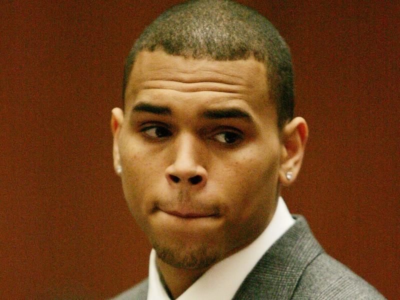 Brown - pleads guilty to attack