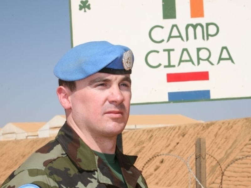 Chad - Capt Tony Bolger puts on blue beret