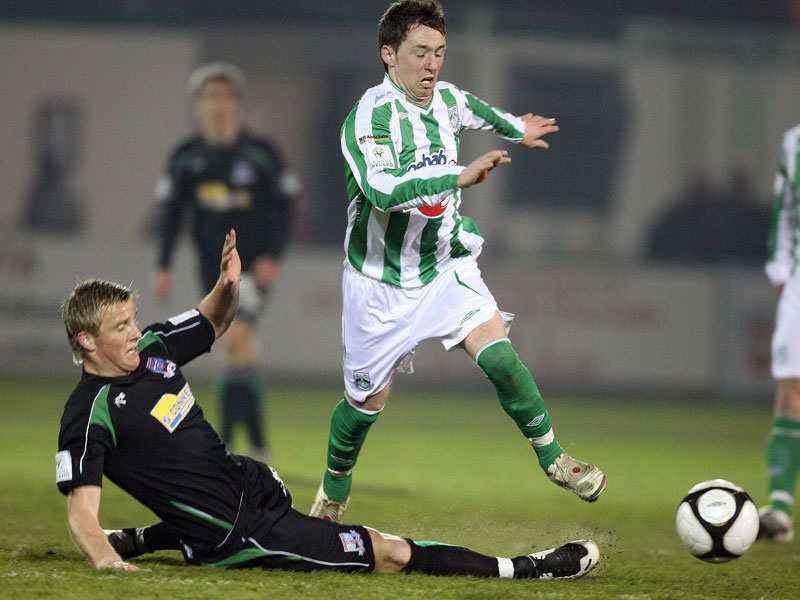Galway United's Sean Kelly tackles Paddy Kavanagh Bray Wanderers