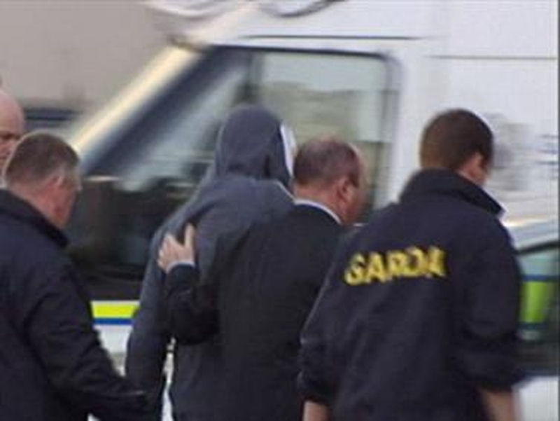 Dublin - David Patchell (in hooded jacket) is led into court