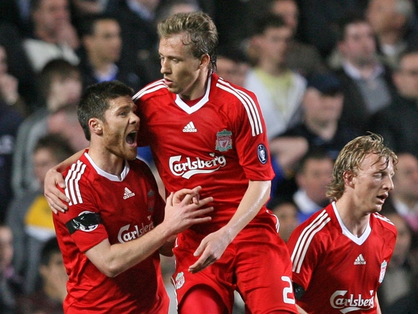 The much-maligned Lucas Leiva (centre) wrapped up the scoring