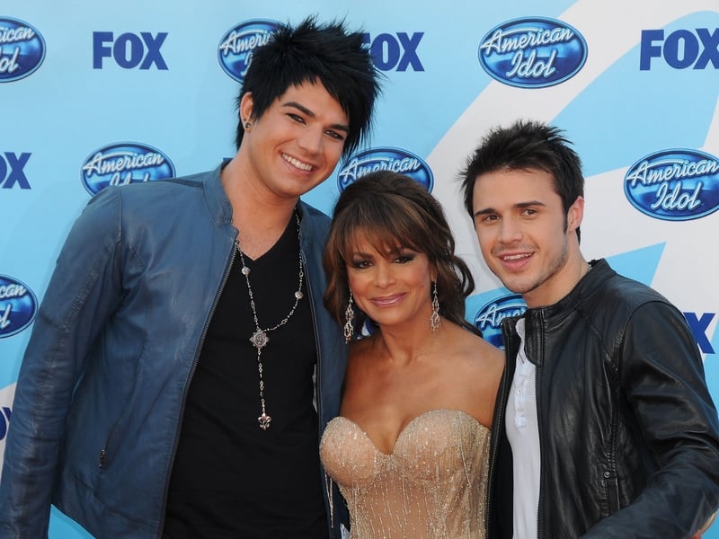 Kris Allen and Adam Lambert pictured with judge Paula Abdul