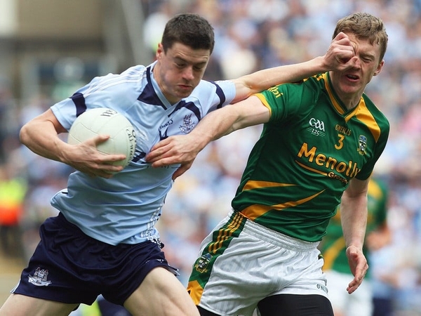 Dublin's Mark Davoren tries to break clear of Meath's Kevin Reilly in today's game at Croke Park