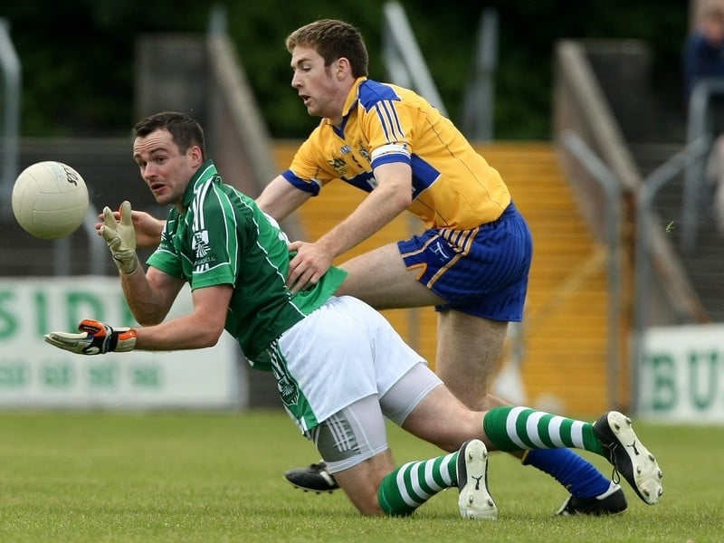 Limerick's Jim O'Donovan and Clare's Kevin Dileen in action in Ennis today