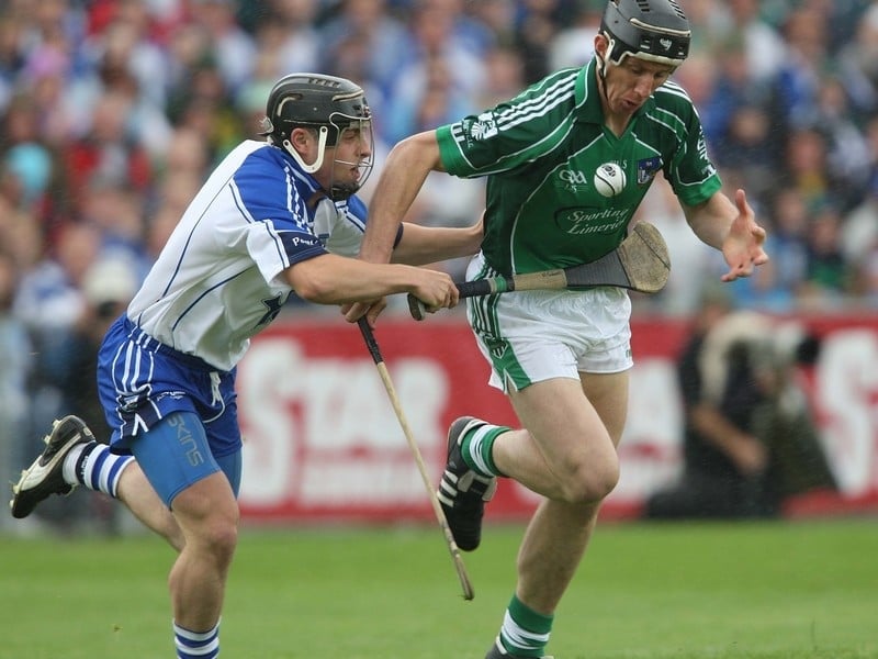 Limerick's Ollie Moran races clear of Waterford's Noel Connors