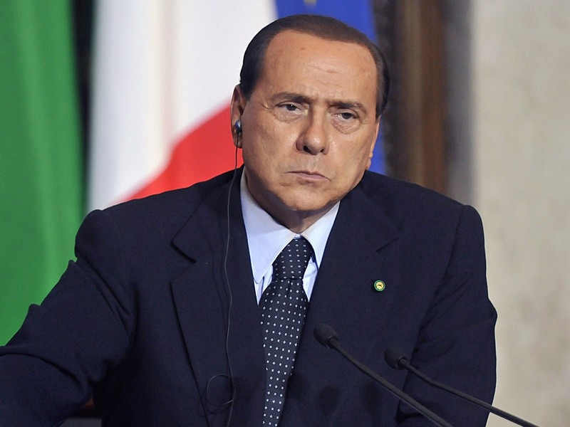 Silvio Berlusconi - Facing two legal battles