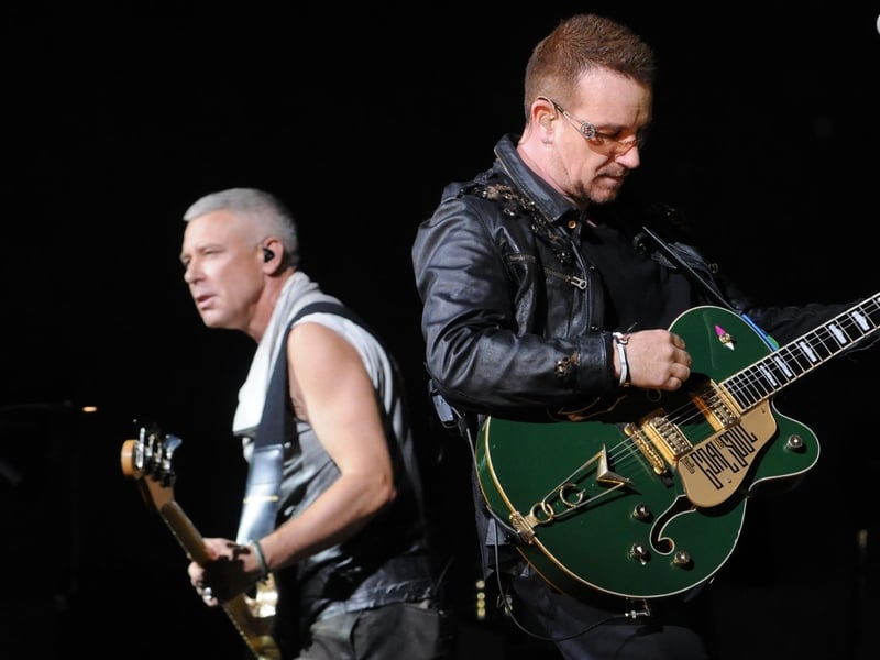Adam Clayton and Bono during last night's performance