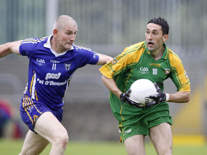 David Russell of Clare with Rory Kavanagh of Donegal