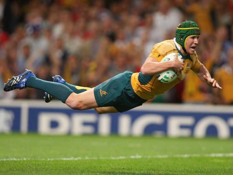 Matt Giteau scores against Wales during the World cup