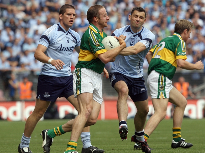 Tommy Griffin and Bernard Brogan battle for possession in this afternoon's quarter-final