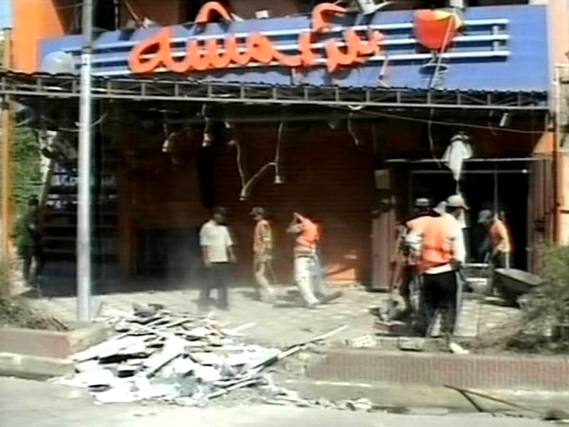 Baghdad - Two car bombs