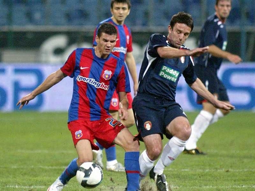 St Pat's' Stuart Byrne battles with Iulian Ochirosii of Steaua
