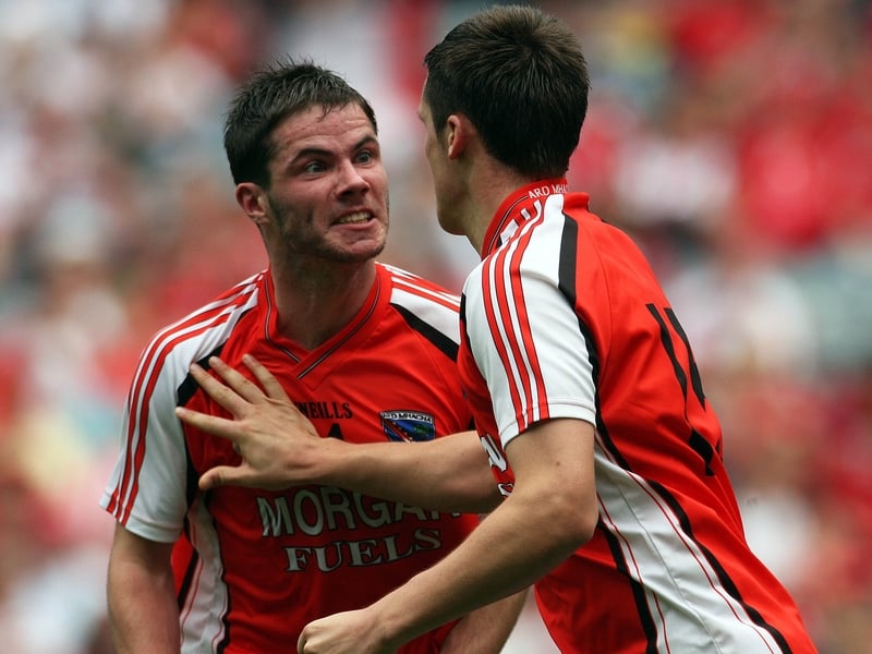 Armagh's Eugene McVerry congratulates Gavin McParland after his second goal