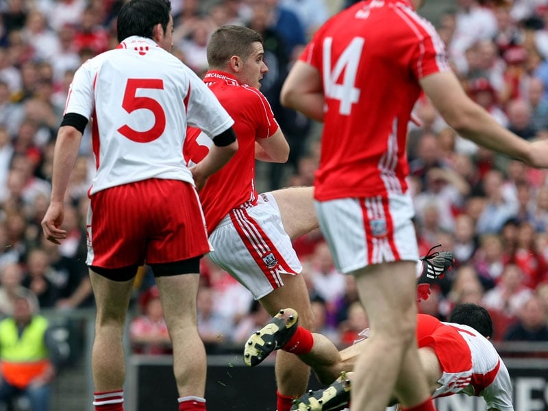 Daniel Goulding (partly hidden) scores Cork's all important goal