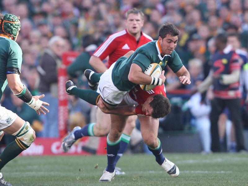 Ruan Pienaar atkes a heavy hit during the Lions tour