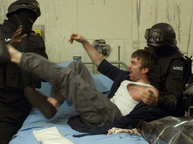 The corporate stooge who realises he's part of something far bigger