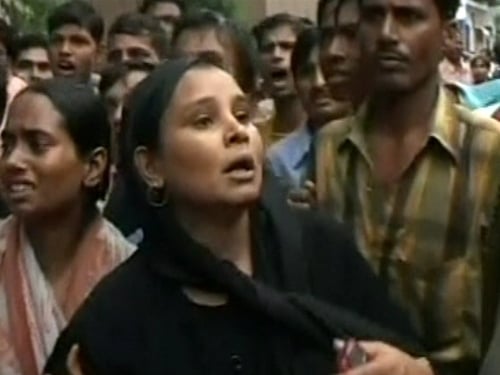 India - Parents gathered for news of their children