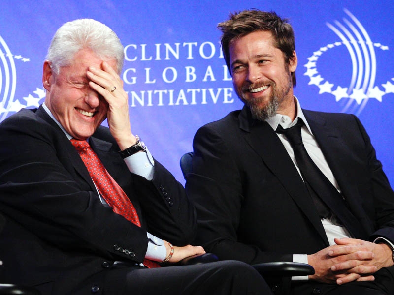 Bill Clinton and Brad Pitt share a joke