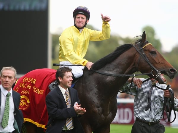 Mick Kinane aboard Sea The Stars after their triumph at Longchamp