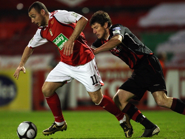 St Pat's Mark Quigley is chased down by Boh's Ken Oman