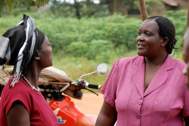 Rita, a successful beekeeper who has 40 bee hives, talks to the project co-ordinator Anne