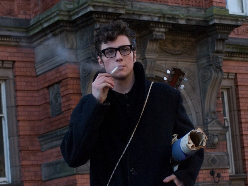 Aaron Johnson as John Lennon