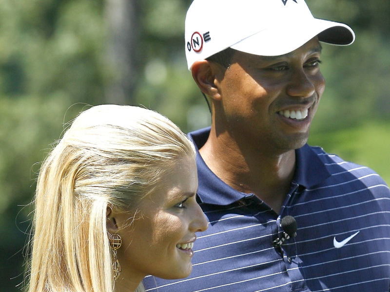 Simpson, Woods - Pictured at a golf tournament in July