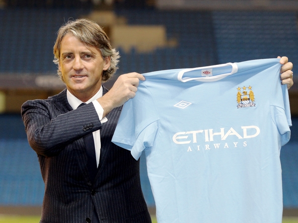 Roberto Mancini's tenure at Manchester City started with a victory
