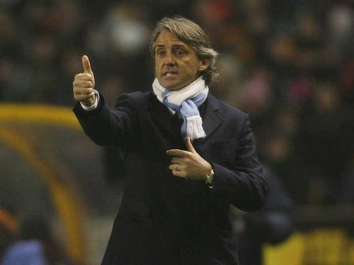 Manchester City manager Roberto Mancini lost his cool with Everton boss David Moyes as his side suffered their first home defeat in the league this season