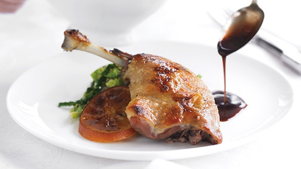 Duck Confit with Savoy Cabbage and Red Onion Sauté