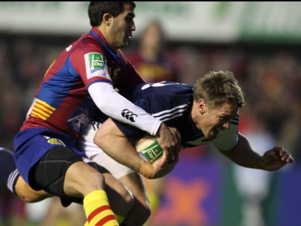 Jean De Villiers drags Maxime Mermoz over the line to score a key try against Perpignan