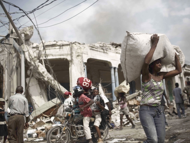 Aid slowly begins to arrive in Haiti