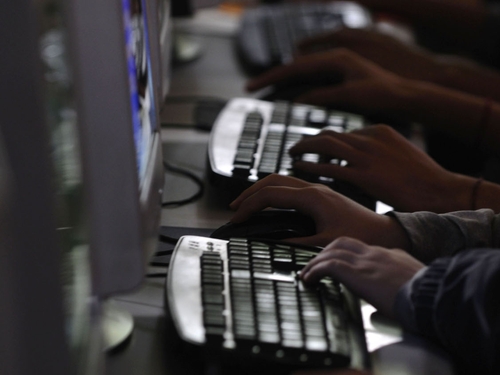 China - Three held in hacker inquiry