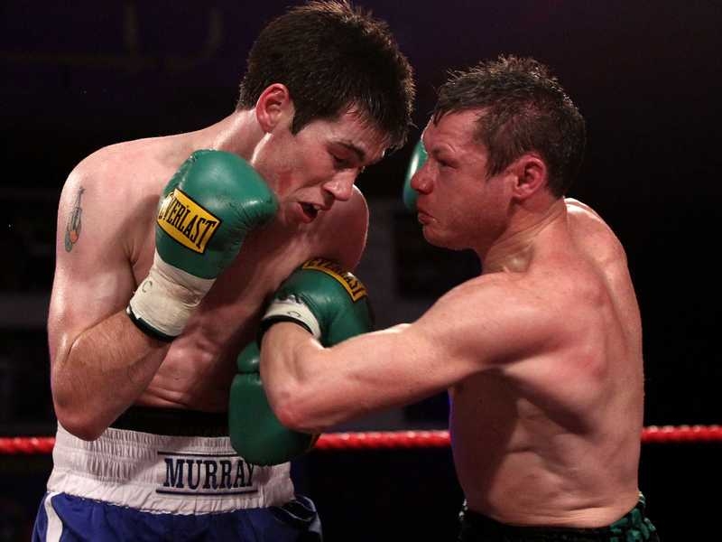 Andy Murray (left) in action against Oisin Fagan