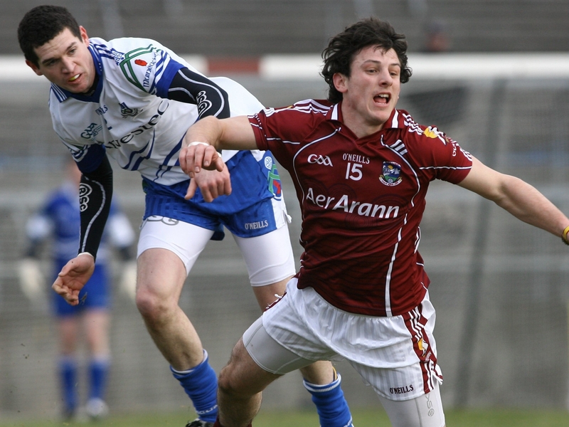 Galway's Sean Armstrong is tackled by Colm Greenan of Monaghan