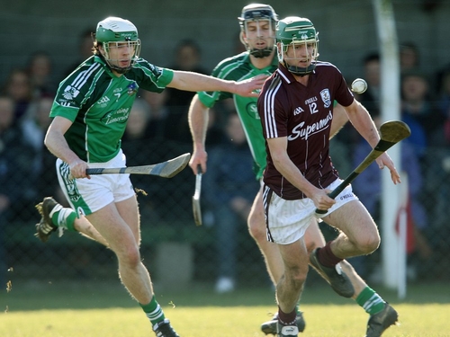 Cathal King of Limerick chases down Galway's David Bourke
