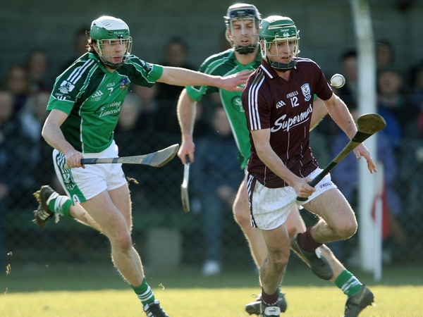 Cathal King of Limerick chases down Galway's David Bourke