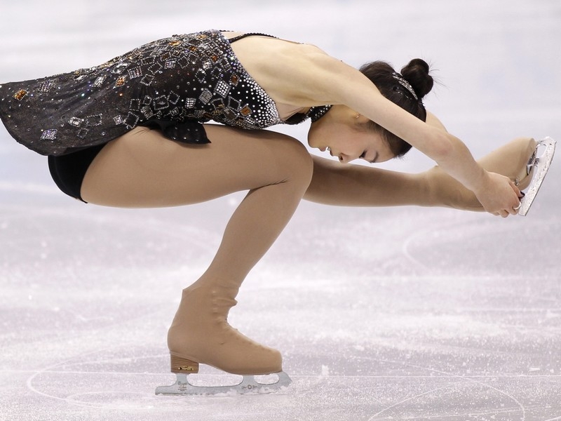 Kim Yu-Na took ladies' figure skating gold