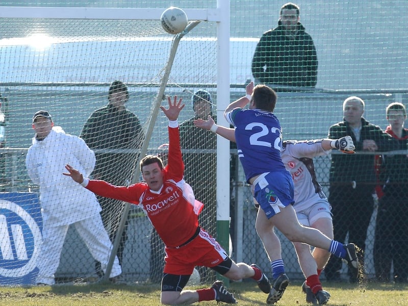 Rory Woods fists a late point for Monaghan