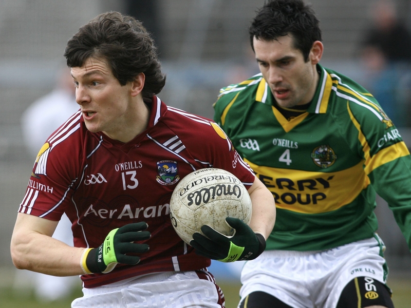 Galway's talismanic Michael Meehan shields the ball from Kerry's Tom O'Sullivan