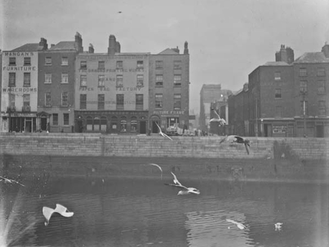 View of 14-18 Ormond Quay Lower and Swifts Row, taken from Wellington Quay, view includes Mangans Furniture Warerooms and Ormond Printing Works