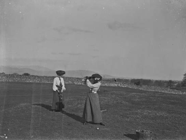 Two ladies playing golf on Golf Links, Ireland 1900-1904