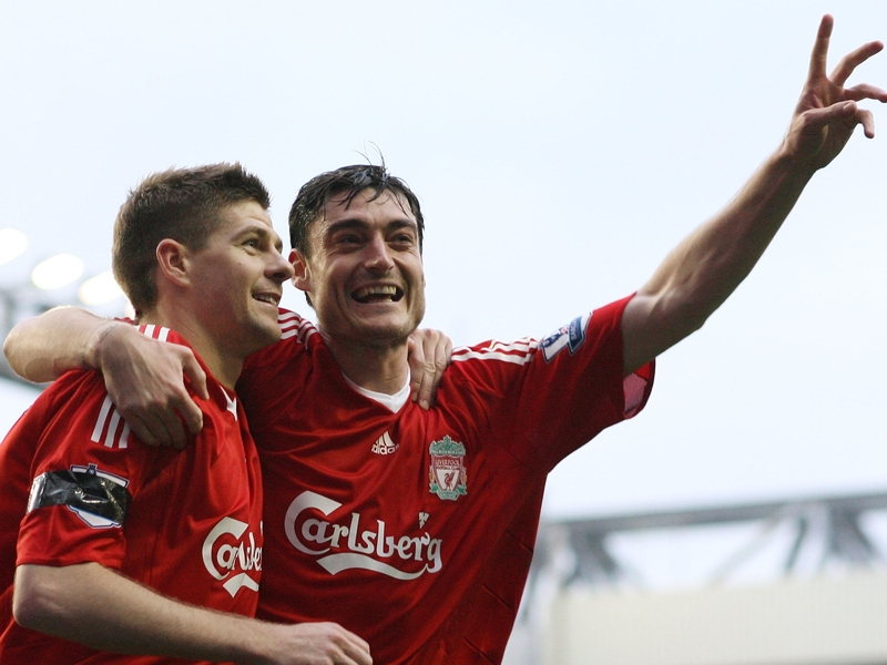 Albert Riera with Steven Gerrard