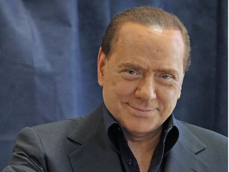Silvio Berlusconi - New law gives him temporary immunity