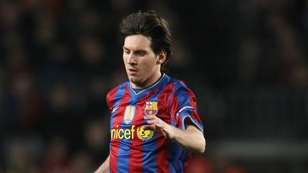 Lionel Messi was carried from the field on a stretcher after a clash with Atletico Madrid defender Tomas Ujfalusi