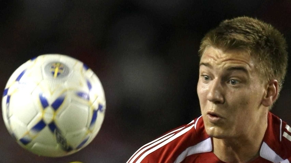 Nicklas Bendtner and the Danes are quietly confident of progessing beyond the group stage